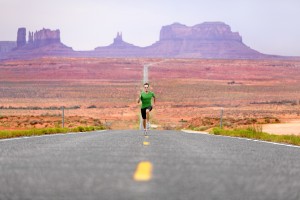 man running on road considering his freelance writing goals