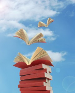 opened books flying away