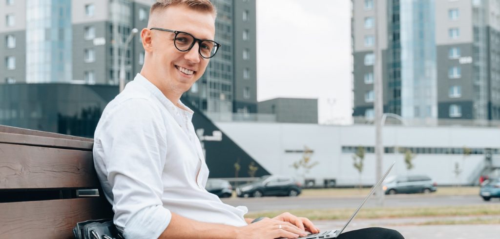man on laptop practicing new social networking