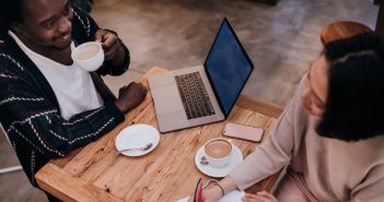 How to Use Your Existing Network to Find Freelance Writing Clients man and woman networking over coffee