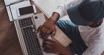 Why Online Copywriting Skills Are Skyrocketing to the Top Tier of All Income-Generating Businesses man online copywriting on laptop at home