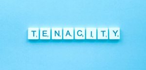 tenacity in scrabble letters